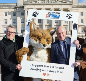 Campaigners with prop and fox mascot